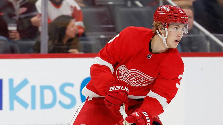 Oct 3, 2022; Detroit, Michigan, USA;  Detroit Red Wings defenseman Simon Edvinsson (3) skates with the puck against the Pittsburgh Penguins at Little Caesars Arena. Mandatory Credit: Rick Osentoski-USA TODAY Sports
