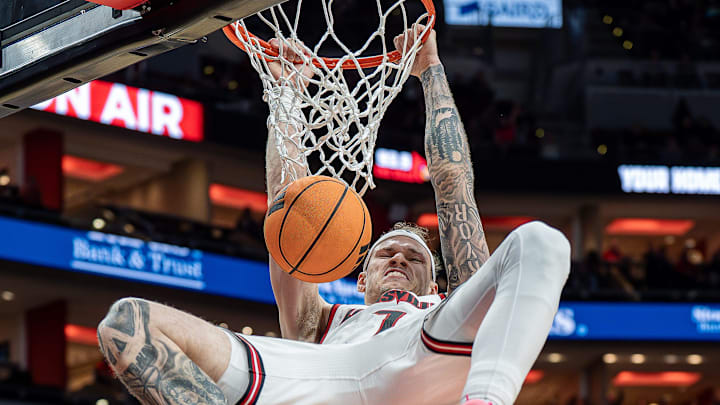 Louisville forward Kasean Pryor (7) slammed home two points during first half action as the Cardinals host Jackson State at the KFC Yum! Center on Tuesday, Nov. 6, 2025. Louisville forward Kasean Pryor (7) slammed home two points during first half action as the Cardinals host Jackson State at the KFC Yum! Center on Tuesday, Nov. 6, 2025.