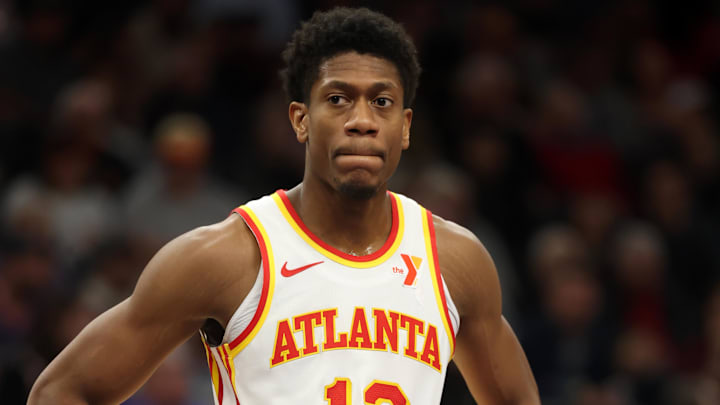 Jan 9, 2025; Phoenix, Arizona, USA; Atlanta Hawks forward De'Andre Hunter (12) against the Phoenix Suns at Footprint Center. Mandatory Credit: Mark J. Rebilas-Imagn Images