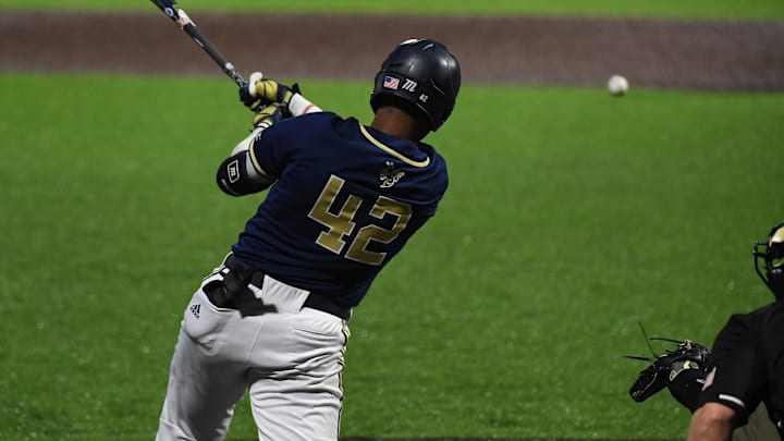 Georgia Tech Yellow Jackets third baseman Justyn-Henry Malloy (42) ropes one the other way for a base knock.