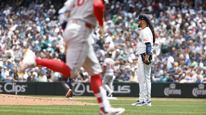 Seattle Mariners pitcher Luis Castillo (right) looks on after surrendering a home run against the Boston Red Sox on June 18 at T-Mobile Park. Seattle Mariners pitcher Luis Castillo (right) looks on after surrendering a home run against the Boston Red Sox on June 18 at T-Mobile Park.