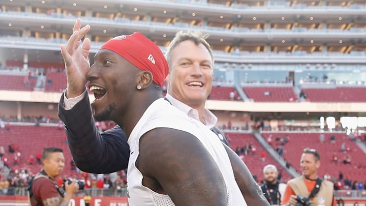 San Francisco 49ers wide receiver Deebo Samuel and general manager John Lynch