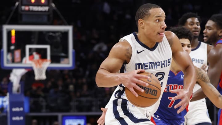 Dec 6, 2023; Detroit, Michigan, USA;  Memphis Grizzlies guard Desmond Bane (22) dribbles in the
