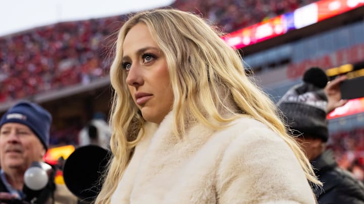 Brittany Mahomes on the sidelines before the AFC Championship game against the Buffalo Bills at GEHA Field at Arrowhead Stadium.