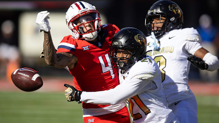 Oct 19, 2024; Tucson, Arizona, USA; Colorado Buffalos safety Shilo Sanders (21) breaks up a pass intended for Arizona Wildcats wide receiver Tetairoa McMillan (4) at Arizona Stadium. Mandatory Credit: Mark J. Rebilas-Imagn Images Oct 19, 2024; Tucson, Arizona, USA; Colorado Buffalos safety Shilo Sanders (21) breaks up a pass intended for Arizona Wildcats wide receiver Tetairoa McMillan (4) at Arizona Stadium. Mandatory Credit: Mark J. Rebilas-Imagn Images