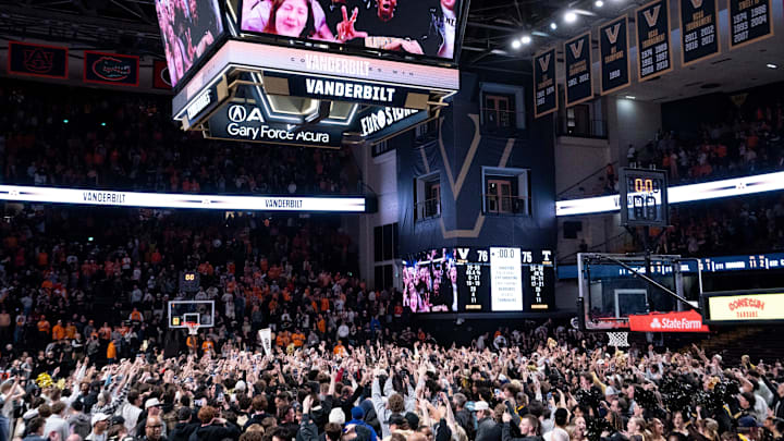 Vanderbilt fans storm the court to celebrate their Commodores win over the Tennessee Volunteers after their game at Memorial Gym in Nashville, Tenn., Saturday, Jan. 18, 2025.