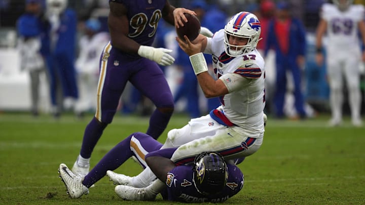 Oct 2, 2022; Baltimore, Maryland, USA; Buffalo Bills quarterback Josh Allen (17) runs for a first down in the third quarter against the Baltimore Ravens at MT Bank Stadium