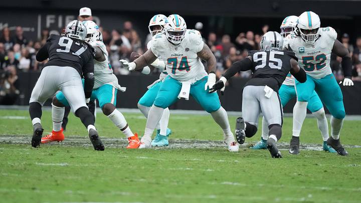 Miami Dolphins guard Kadyn Proctor (74) and offensive tackle Patrick Paul (52) defend against Las Vegas Raiders defensive tackle Tonka Hemingway (97) and defensive end Kwity Paye (95) at Allegiant Stadium in the 2026 season opener. Miami Dolphins guard Kadyn Proctor (74) and offensive tackle Patrick Paul (52) defend against Las Vegas Raiders defensive tackle Tonka Hemingway (97) and defensive end Kwity Paye (95) at Allegiant Stadium in the 2026 season opener.