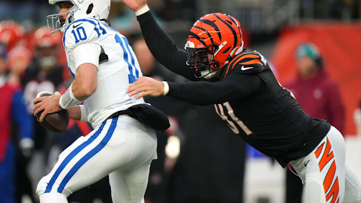 Cincinnati Bengals defensive end Trey Hendrickson (91) sacks Indianapolis Colts quarterback Gardner Minshew (10) in the fourth quarter during a Week 14 NFL game between the Indianapolis Colts and the Cincinnati Bengals, Sunday, Dec. 10, 2023, at Paycor Stadium in Cincinnati.