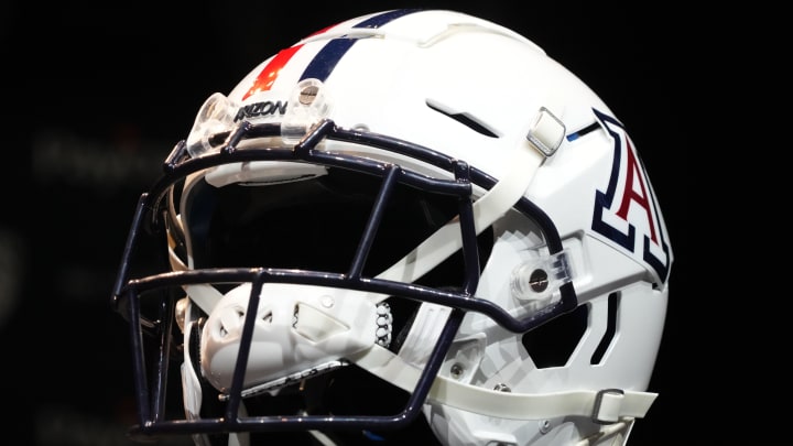 An Arizona Wildcats helmet on display An Arizona Wildcats helmet on display