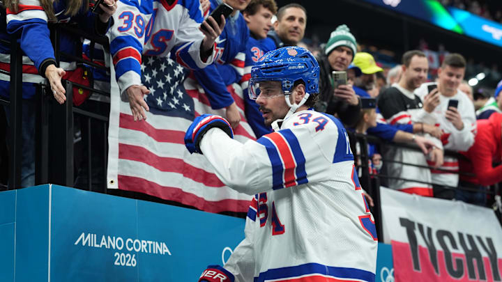 Feb 22, 2026; Milan, Italy; Auston Matthews (34) of the United States greets fans before playing against Canada in the men's ice hockey gold medal game during the Milano Cortina 2026 Olympic Winter Games at Milano Santagiulia Ice Hockey Arena. Mandatory Credit: Amber Searls-Imagn Images Feb 22, 2026; Milan, Italy; Auston Matthews (34) of the United States greets fans before playing against Canada in the men's ice hockey gold medal game during the Milano Cortina 2026 Olympic Winter Games at Milano Santagiulia Ice Hockey Arena. Mandatory Credit: Amber Searls-Imagn Images