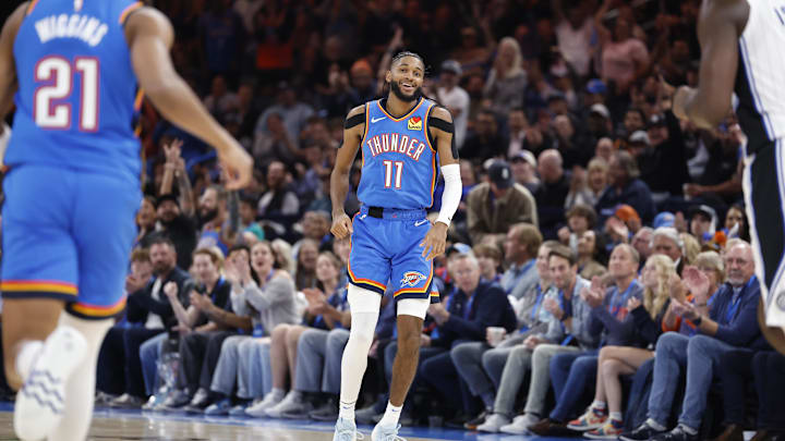 Nov 4, 2024; Oklahoma City, Oklahoma, USA; Oklahoma City Thunder guard Isaiah Joe (11) smiles after scoring against the Orlando Magic during the second half at Paycom Center. Mandatory Credit: Alonzo Adams-Imagn Images