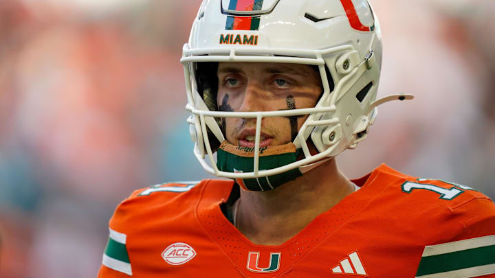 Nov 8, 2025; Miami Gardens, Florida, USA; Miami Hurricanes quarterback Carson Beck (11) looks to the bench in a game against the Syracuse Orange. Nov 8, 2025; Miami Gardens, Florida, USA; Miami Hurricanes quarterback Carson Beck (11) looks to the bench in a game against the Syracuse Orange.