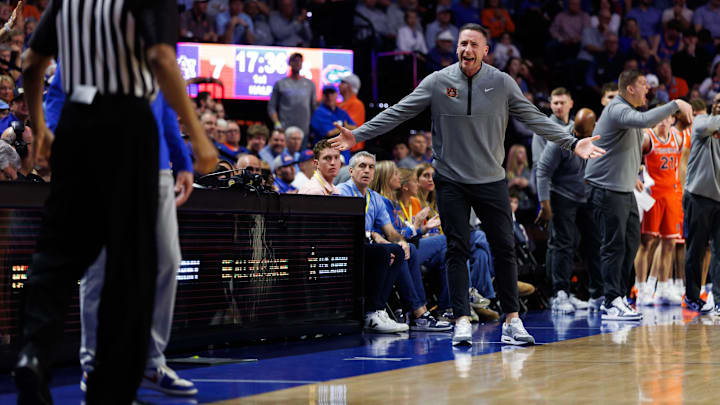 Jan 24, 2026; Gainesville, Florida, USA; Auburn Tigers head coach Steven Pearl argues a call with the referee against the Florida Gators during the first half at Exactech Arena at the Stephen C. O'Connell Center. Mandatory Credit: Matt Pendleton-Imagn Images