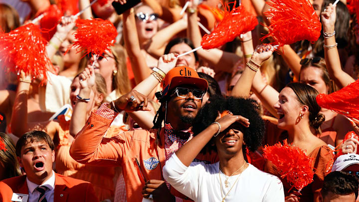 Sep 30, 2023; Auburn, Alabama, USA; Former NFL and Auburn Tigers quarterback Cam Newton cheers in the student section against the Georgia Bulldogs during the first quarter at Jordan-Hare Stadium. Mandatory Credit: John David Mercer-Imagn Images