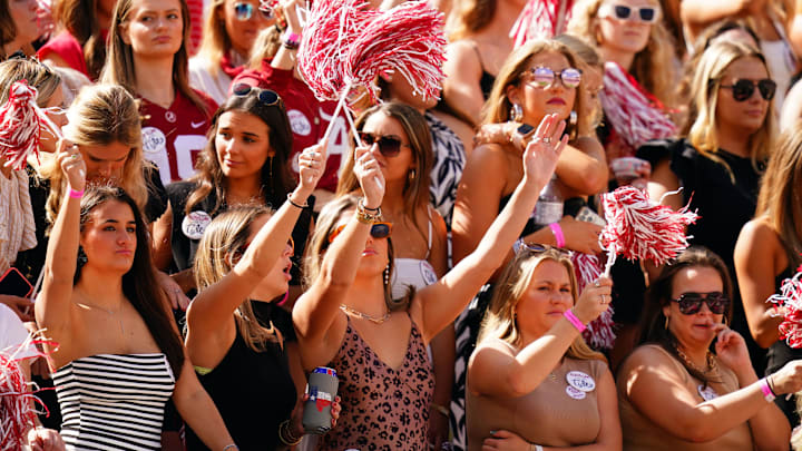 Oct 14, 2023; Tuscaloosa, Alabama, USA; Alabama Crimson Tide fans cheer from the student section against the Arkansas Razorbacks during the first quarter at Bryant-Denny Stadium. Mandatory Credit: John David Mercer-Imagn Images