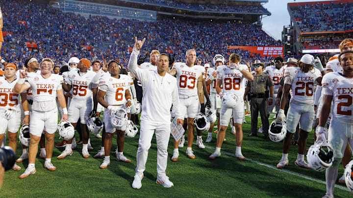 Oct 4, 2025; Gainesville, Florida, USA; Texas Longhorns head coach Steve Sarkisian stands with his team after a game against the Florida Gators at Ben Hill Griffin Stadium. 