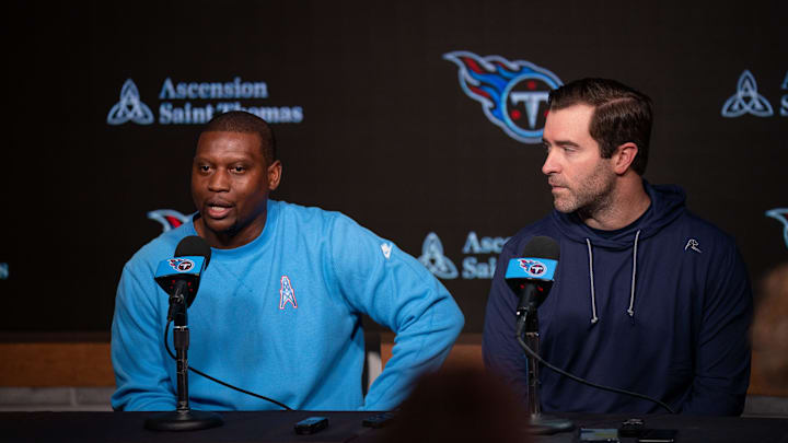 Tennessee Titans Defensive Coordinator Dennard Wilson, left, fields questions with Head Coach Brian