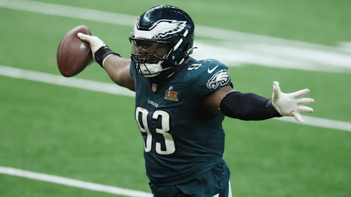 Feb 9, 2025; New Orleans, LA, USA; Philadelphia Eagles defensive tackle Milton Williams (93) celebrates a fumble recovery in the fourth quarter in Super Bowl LIX at Ceasars Superdome. Mandatory Credit: Stephen Lew-Imagn Images