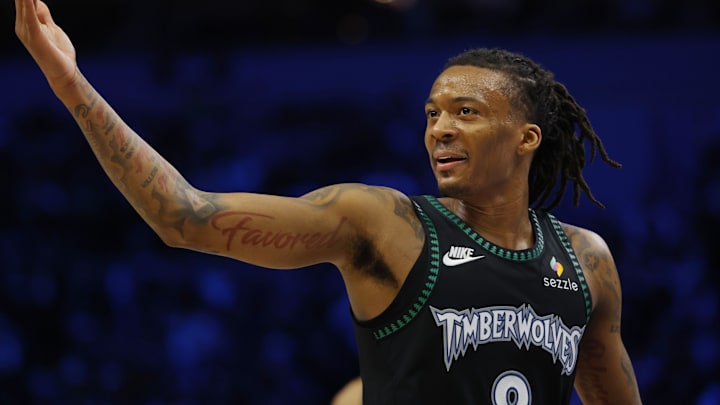 Mar 25, 2026; Minneapolis, Minnesota, USA; Minnesota Timberwolves guard Bones Hyland (8) celebrates his three-point basket against the Houston Rockets to the crowd in the third quarter at Target Center. Mandatory Credit: Bruce Kluckhohn-Imagn Images