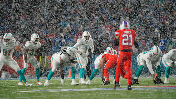 Miami Dolphins quarterback Tua Tagovailoa (1) calls signals prior to the snap against the Buffalo Bills during the second half at Highmark Stadium in December 2022. Miami Dolphins quarterback Tua Tagovailoa (1) calls signals prior to the snap against the Buffalo Bills during the second half at Highmark Stadium in December 2022.