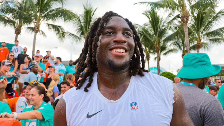 Miami Dolphins offensive tackle Patrick Paul (52) looks on after signing autographs for the fans during training camp at Baptist Health Training Complex this summer. Miami Dolphins offensive tackle Patrick Paul (52) looks on after signing autographs for the fans during training camp at Baptist Health Training Complex this summer.