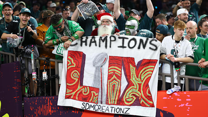 Feb 9, 2025; New Orleans, LA, USA; Philadelphia Eagles fans celebrate in the stands after Super Bowl LIX against the Kansas City Chiefs at Ceasars Superdome. Mandatory Credit: Mark J. Rebilas-Imagn Images