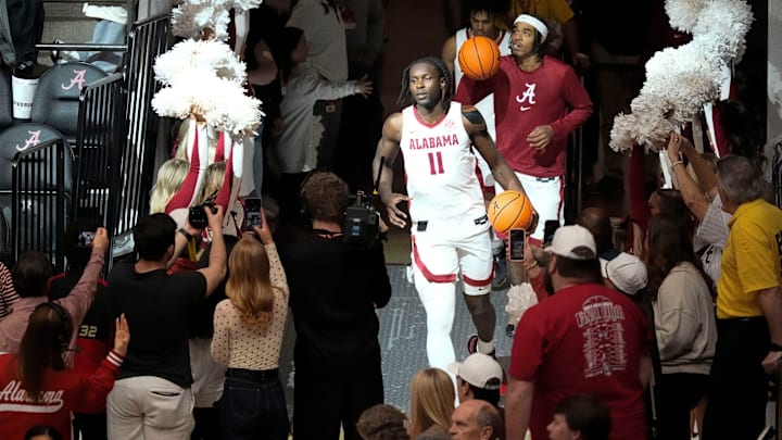 Feb 1, 2025; Tuscaloosa, AL, USA; Alabama center Clifford Omoruyi (11) comes out of the locker room for the Georgia game at Coleman Coliseum. Mandatory Credit: Gary Cosby Jr.-Tuscaloosa News