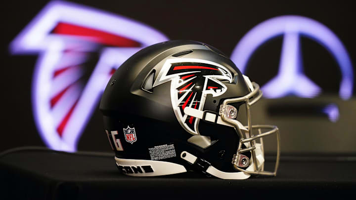 Atlanta Falcons helmet on the table before Raheem Morris is introduced as the new head coach of the Atlanta Falcons. Atlanta Falcons helmet on the table before Raheem Morris is introduced as the new head coach of the Atlanta Falcons.