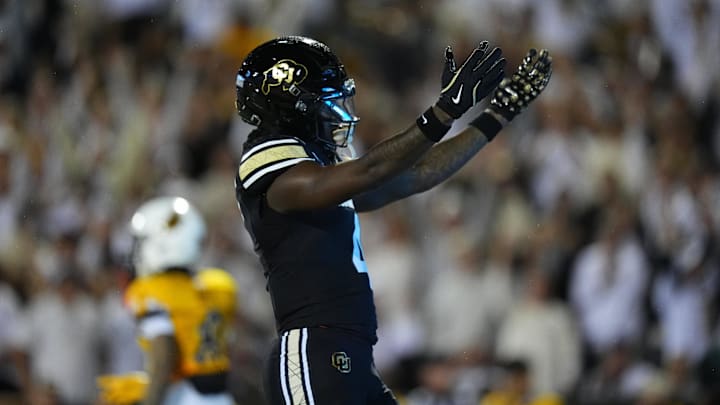 Colorado Buffaloes wide receiver Omarion Miller (4) celebrates a touchdown reception in the second quarter against the Wyoming Cowboys at Folsom Field. 