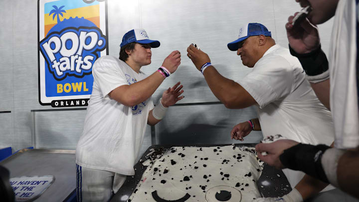 BYU Cougars quarterback Bear Bachmeier (47) and head coach Kalani Sitake