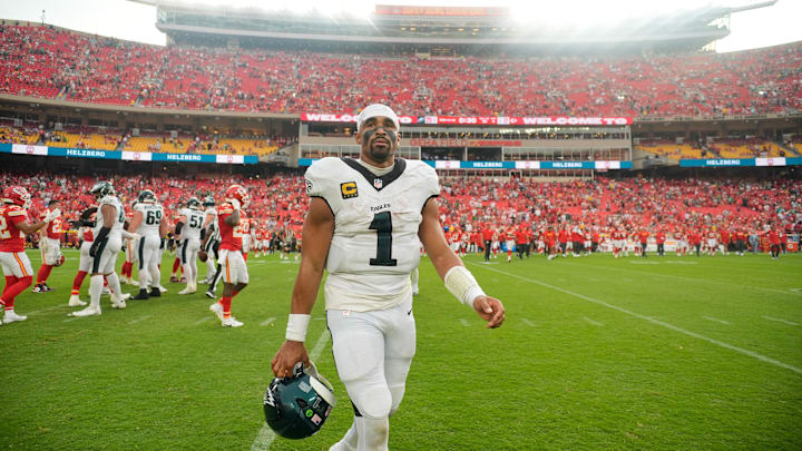 Sep 14, 2025; Kansas City, Missouri, USA; Philadelphia Eagles quarterback Jalen Hurts (1) looks on after the game against the Kansas City Chiefs at GEHA Field at Arrowhead Stadium.