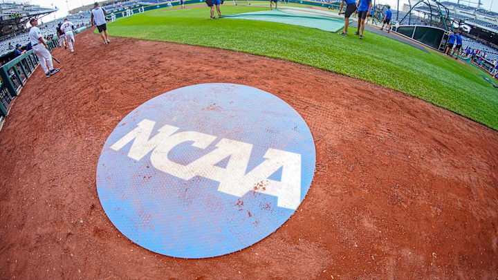 Jun 18, 2023; Omaha, NE, USA; An on-deck circle with the NCAA logo is pictured on the field before the game between the Virginia Cavaliers and the TCU Horned Frogs at Charles Schwab Field Omaha. Mandatory Credit: Dylan Widger-Imagn Images