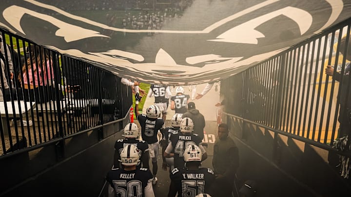 Sep 23, 2023; East Hartford, Connecticut, USA; The UConn Huskies run onto the field before the start of the game against the Duke Blue Devils at Rentschler Field at Pratt & Whitney Stadium. Mandatory Credit: David Butler II-Imagn Images