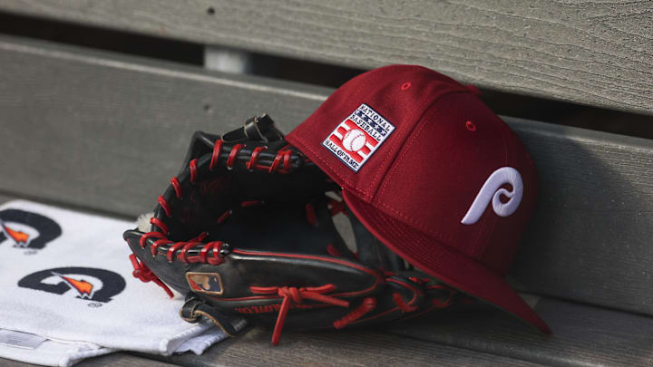Jul 25, 2025; Bronx, New York, USA; A detailed view of a Hall of Fame patch on a Philadelphia Phillies hat resting in the dugout during the second inning against the New York Yankees at Yankee Stadium. Mandatory Credit: Vincent Carchietta-Imagn Images