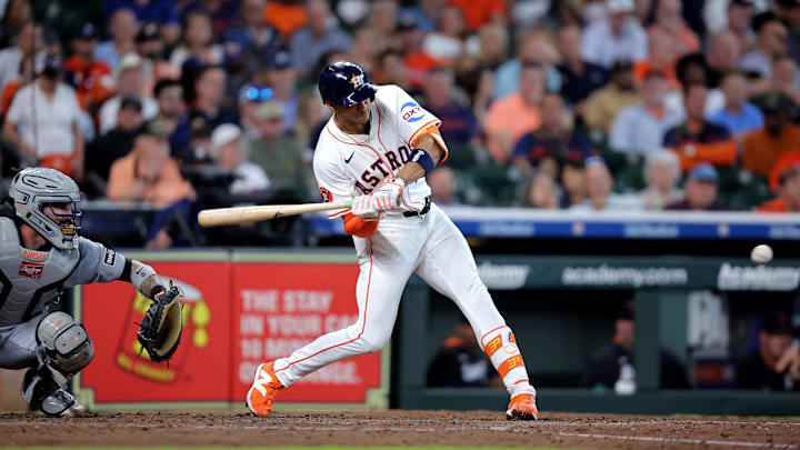 Apr 30, 2025; Houston, Texas, USA; Houston Astros shortstop Jeremy Pena (3) hits a single against the Detroit Tigers during the fifth inning at Daikin Park.