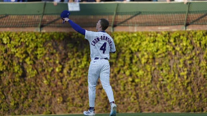 May 5, 2025; Chicago, Illinois, USA; Chicago Cubs outfielder Pete Crow-Armstrong (4) waves to the fans before a game against the San Francisco Giants at Wrigley Field. 