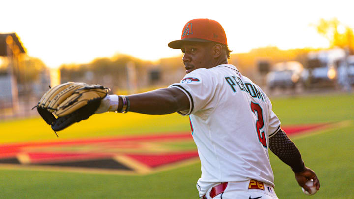 Feb 19, 2025; Scottsdale, AZ, USA; Arizona Diamondbacks infielder Geraldo Perdomo (2) poses for a portrait for MLB Media Day at Salt River Fields.  Mandatory Credit: Allan Henry-Imagn Images