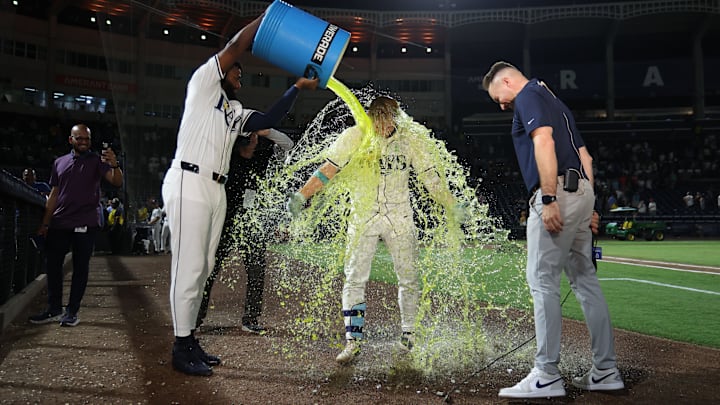 Tampa Bay shortstop Taylor Walls (6) gets a Powerade bath after hitting a walk-off sacrifice fly to beat the Houston Astros. 
