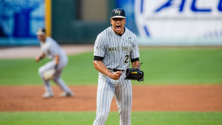 May 24, 2024; Charlotte, NC, USA; Wake Forest pitcher Chase Burns (29) celebrates after a strikeout in th second inning against the North Carolina Tar Heels during the ACC Baseball Tournament at Truist Field. Mandatory Credit: Scott Kinser-USA TODAY Sports May 24, 2024; Charlotte, NC, USA; Wake Forest pitcher Chase Burns (29) celebrates after a strikeout in th second inning against the North Carolina Tar Heels during the ACC Baseball Tournament at Truist Field. Mandatory Credit: Scott Kinser-USA TODAY Sports