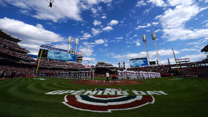 Military helicopters perform a flyover as the national anthem concludes before a baseball game between the Washington Nationals and the Cincinnati Reds on Opening Day, Thursday, March 28, 2024, at Great American Ball Park in Cincinnati.
