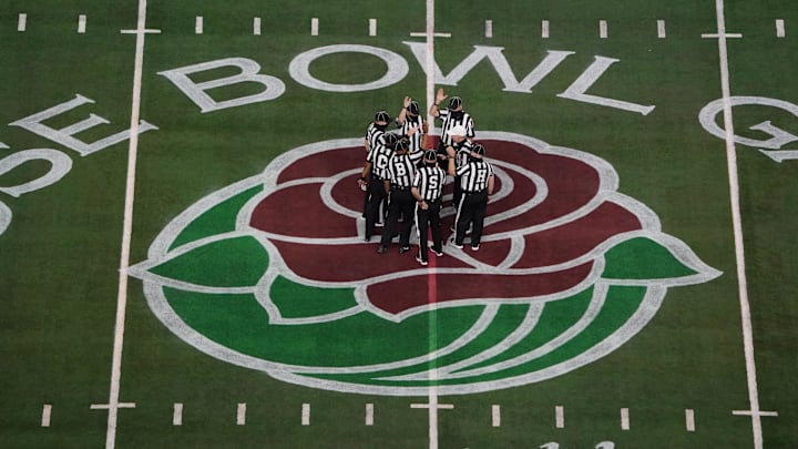 Jan 1, 2021; Arlington, TX, USA; General view as official referees meet midfield before the Rose Bowl between the Notre Dame Fighting Irish and the Alabama Crimson Tide at AT&T Stadium. Jan 1, 2021; Arlington, TX, USA; General view as official referees meet midfield before the Rose Bowl between the Notre Dame Fighting Irish and the Alabama Crimson Tide at AT&T Stadium.