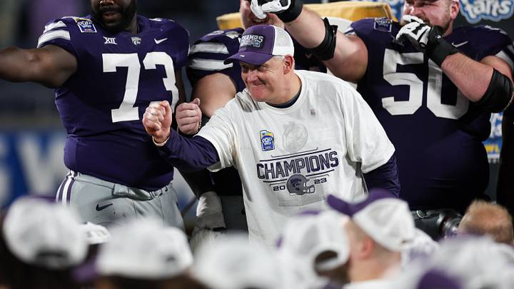 Dec 28, 2023; Orlando, FL, USA; Kansas State Wildcats head coach Chris Klieman celebrates after beating the North Carolina State Wolfpack in the Pop-Tarts bowl at Camping World Stadium. Mandatory Credit: Nathan Ray Seebeck-USA TODAY Sports Dec 28, 2023; Orlando, FL, USA; Kansas State Wildcats head coach Chris Klieman celebrates after beating the North Carolina State Wolfpack in the Pop-Tarts bowl at Camping World Stadium. Mandatory Credit: Nathan Ray Seebeck-USA TODAY Sports