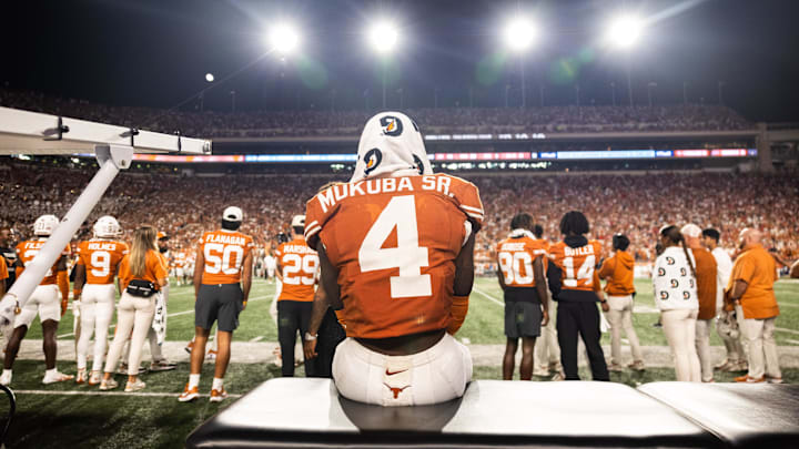 Oct 19, 2024; Austin, Texas, USA; Texas Longhorns safety Andrew Mukuba (4) watching the game in the fourth quarter against the Georgia Bulldogs at Darrell K Royal-Texas Memorial Stadium. Mandatory Credit: Brett Patzke-Imagn Images