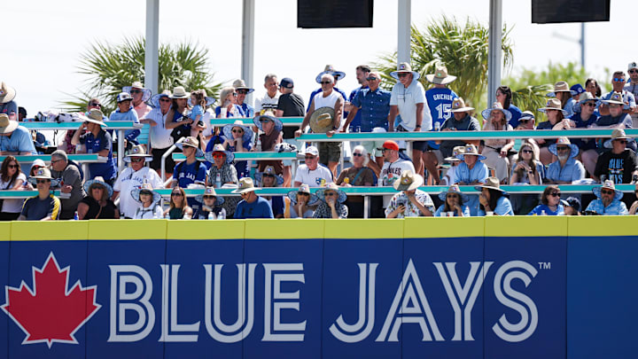 Dunedin, Florida, USA; Fans watch a game between the Toronto Blue Jays and the Baltimore Orioles during spring training at TD Ballpark.