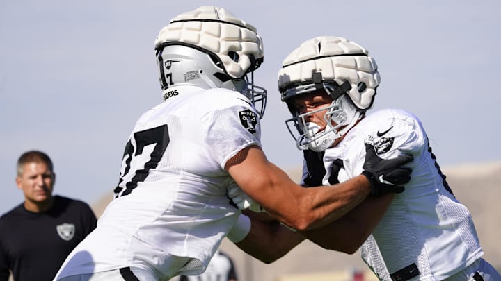 Jul 28, 2022; Las Vegas, Nevada, US; Las Vegas Raiders tight ends Jesper Horsted (right) and Foster Moreau (87) run through a drill during training camp at Intermountain Healthcare Performance Center.  Mandatory Credit: Lucas Peltier-USA TODAY Sports