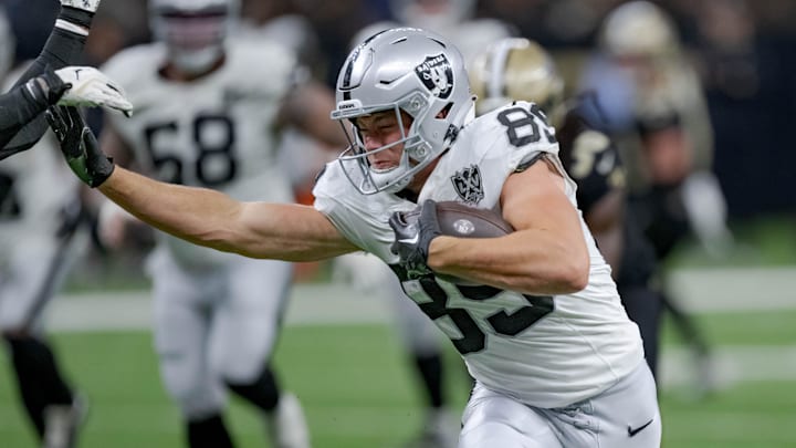Dec 29, 2024; New Orleans, Louisiana, USA; Las Vegas Raiders tight end Brock Bowers (89) runs against New Orleans Saints safety Tyrann Mathieu (32) during the third quarter at Caesars Superdome. Mandatory Credit: Matthew Hinton-Imagn Images