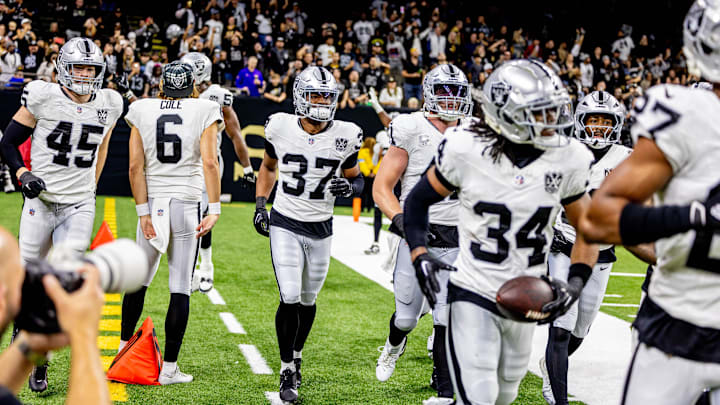 Dec 29, 2024; New Orleans, Louisiana, USA;  Las Vegas Raiders safety Thomas Harper (34) celebrates after an interception against the New Orleans Saints during the second half at Caesars Superdome. Mandatory Credit: Stephen Lew-Imagn Images