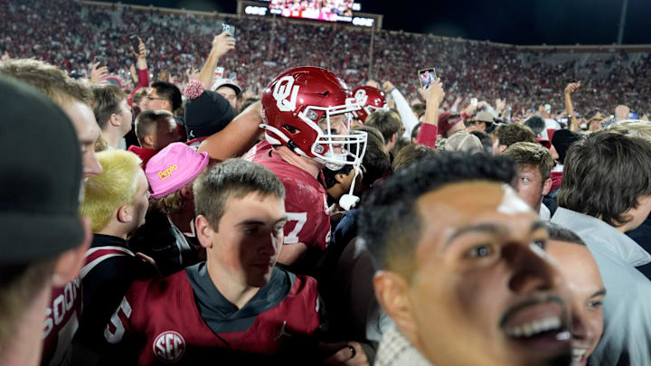 Oklahoma fans celebrate their team's 24–3 win over No. 7 Alabama on Nov. 23, 2024.
