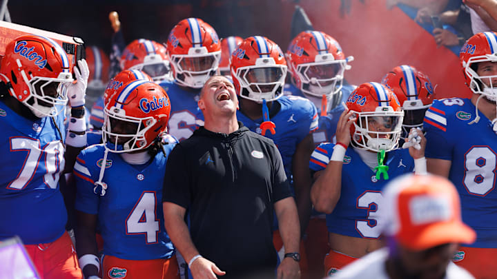 Sep 6, 2025; Gainesville, Florida, USA; Florida Gators head coach Billy Napier screams while surrounded by his team before a game against the South Florida Bulls at Ben Hill Griffin Stadium. Mandatory Credit: Matt Pendleton-Imagn Images Sep 6, 2025; Gainesville, Florida, USA; Florida Gators head coach Billy Napier screams while surrounded by his team before a game against the South Florida Bulls at Ben Hill Griffin Stadium. Mandatory Credit: Matt Pendleton-Imagn Images